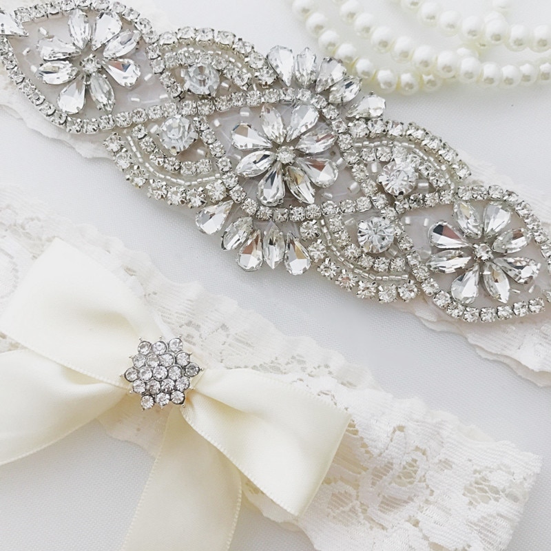 Wedding Bridal Garter Set Crystal Rhinestone on a WHITE Lace crystal Toss Garter Set with Ivory Bow