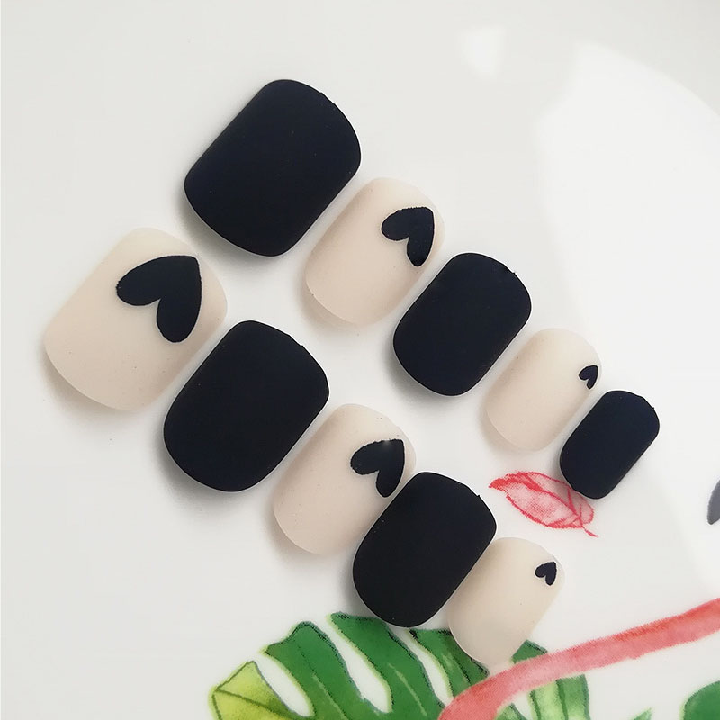 24Pcs Fake Nail Tips For Women Frosted Matte Nails with glue Nude with Black Love Heart Print designs Press On false fingernail